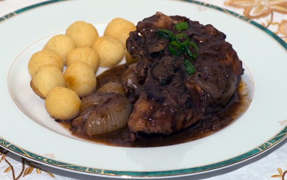 Chicken in Red Wine with Mushrooms, Bacon, and Pearl Onions